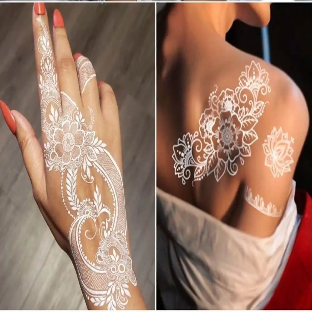 White henna designs on a hand and shoulder.